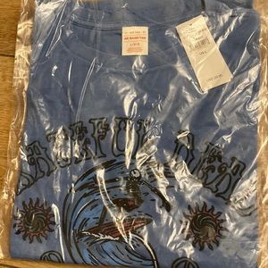 Brand new with tags and in packaging American eagle Grateful Dead band tee